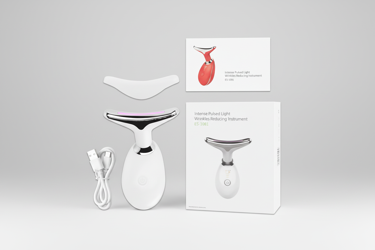 White skincare device with packaging and accessories on a white background